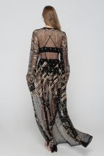 Woman wearing black beachwear kimono