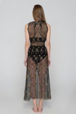 Woman wearing floral beachwear kimono